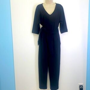 By Anthropologie - Black Woven VNeck Wide Leg Jumpsuit Size Small
